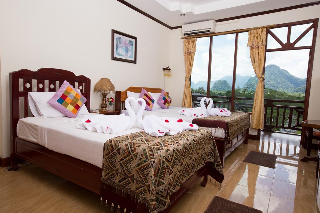 Thavisouk Riverside Hotel Vang Vieng Exterior photo